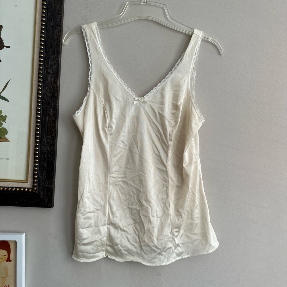 Vintage slip tank top with lace trim and bow appliqué!